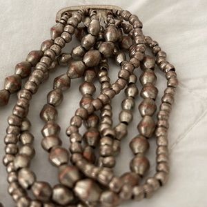 Metal necklace & stretch bracelet set.